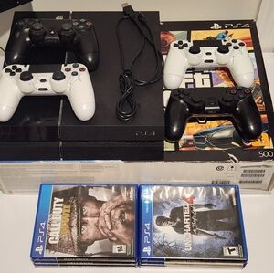 Sony PS4 Console with Black and White Controllers, Six Games